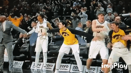 Iowa Basketball Players Dancing on Court