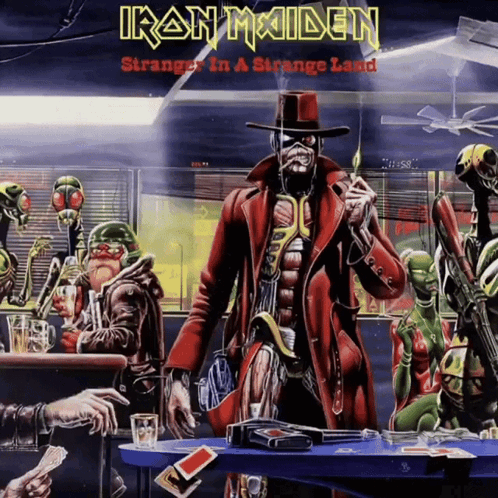 Iron Maiden Strange In A Strange Land Shows A Man In A Top Hat GIF