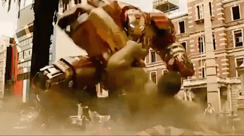 Iron Man And Hulk Fighting In City GIF