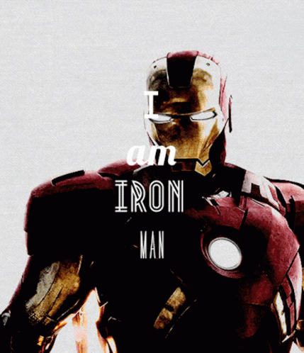 Iron Man Standing in Front of City at Night