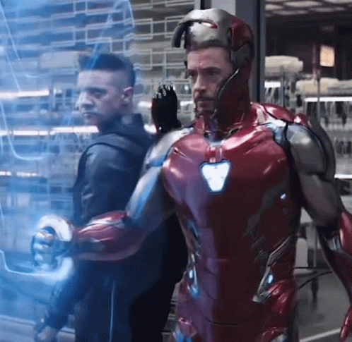 Iron Man Suit Man Next to Black Jacket Man