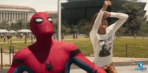 Iron Spider Climbing On Building GIF