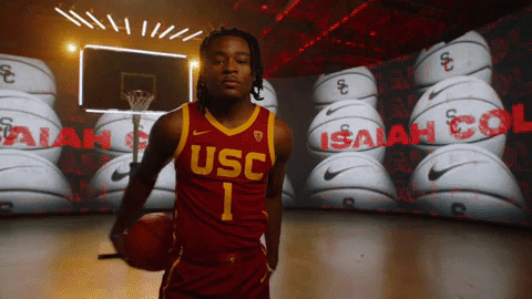 Isaiah Collier Usc Player Holding Ball Left To Right GIF