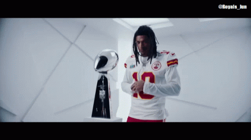 Isiah Pacheco With Trophy GIF