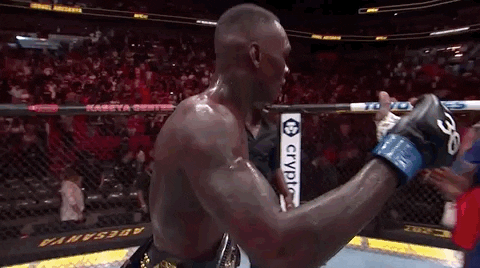 Israel Adesanya Bowing To His Father GIF