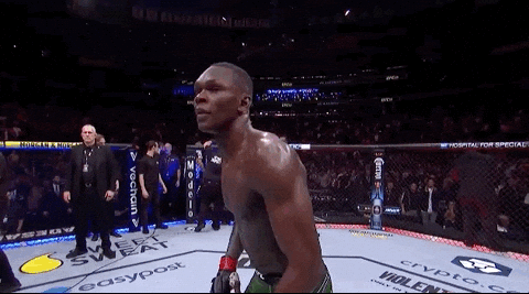 Israel Adesanya Bowing To The Audience GIF