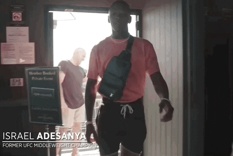 Israel Adesanya Giving Low Five GIF