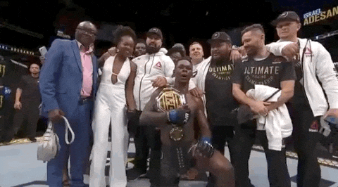 Israel Adesanya Taking Photo With Team GIF