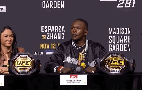 Israel Adesanya Waving To The Audience GIF
