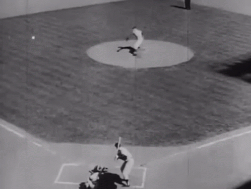 It Is A Black And White Photo Of A Baseball Game . GIF