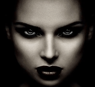 It Is A Black And White Photo Of A Woman 'S Face With Dark Lipstick And Evil Eyes . GIF