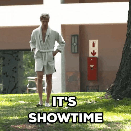 It's Showtime Man Walking In Robes GIF