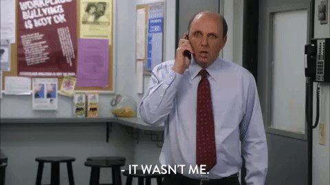 It Wasn't Me Talking To Phone GIF