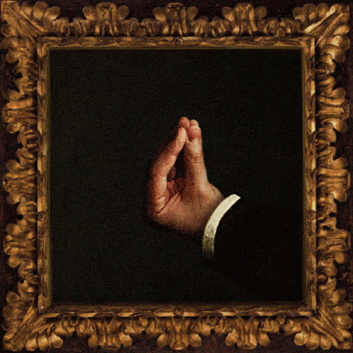 Italian Hand Gesture In Frame GIF