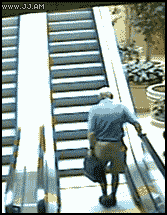 Its A Man Baby Fall On The Escalator GIF