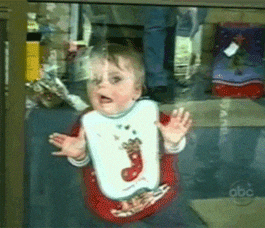 Its A Man Baby Playing On The Glass GIF