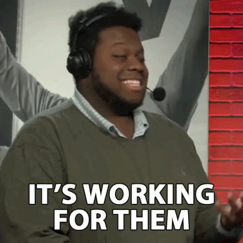 Big Guy With A Headset Its Working For Them GIF