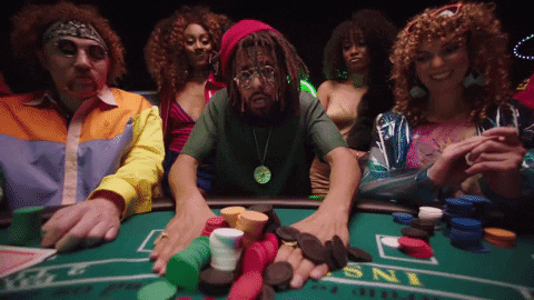 J Cole Giving Poker Chips GIF