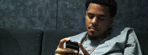 J Cole Looking On Phone GIF