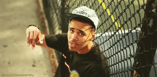J Cole Rapping On Fence GIF