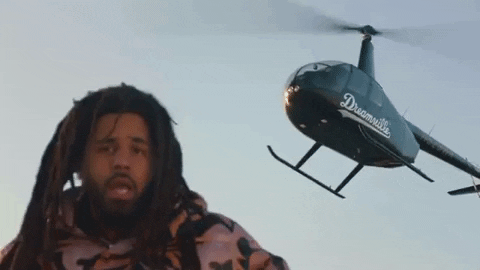 J Cole Rapping With Helicopter Above GIF