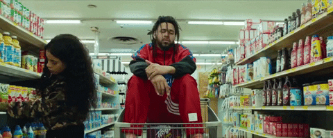 J Cole Riding Grocery Cart GIF