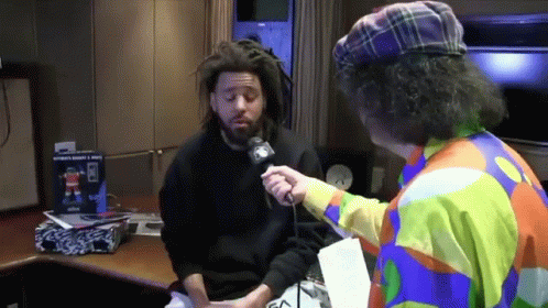 J Cole Suspicious On The Interviewer GIF