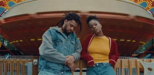 J Cole With Girl On Amusement Park GIF