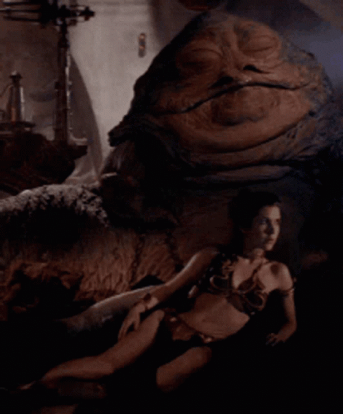 Jabba The Hutt With Woman Lying In Front GIF