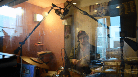 Jack Antonoff Playing Drum Inside A Room GIF