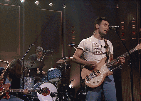 Jack Antonoff Playing Lead Guitar On Stage GIF