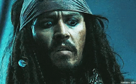Jack Sparrow From Pirates Of The Caribbean Has A Beard And A Bandana Around His Head GIF