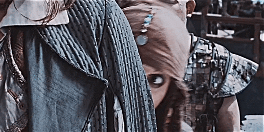 Jack Sparrow Hides Bites Finger GIF