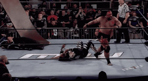 Jacob Fatu Body Slamming Opponent From Ring Ropes GIF