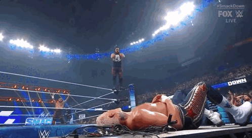 Jacob Fatu Jumping From On Top Of Ring GIF