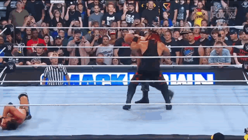 Jacob Fatu Pushing And Body Slamming Opponent GIF