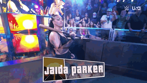 Jaida Parker Holding Bat in Front of Crowd