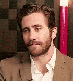 Jake Gyllenhaal Serious Stare Wink GIF