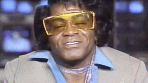 James Brown Smiling With A Big Glasses GIF