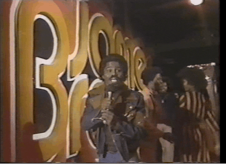 James Brown Holding A Mic GIF