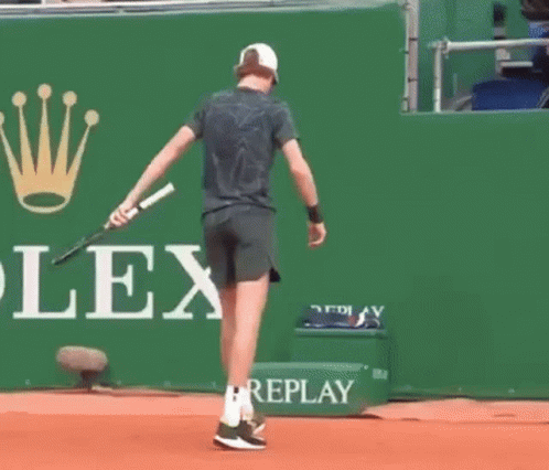 Jannik Sinner Tennis Court Rolex Logo GIF
