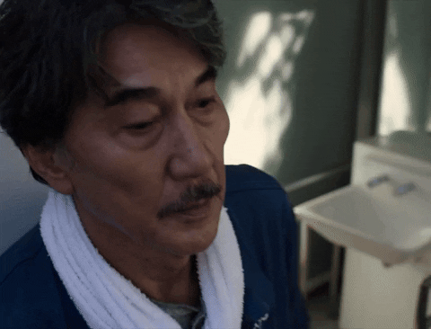 Japanese Actor Kōji Yakusho Looks Up GIF