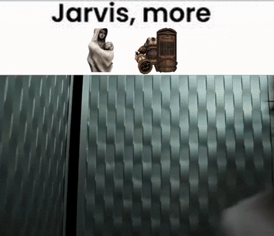 Jarvis More Is Written Above A Statue Of A Man Holding A Baby GIF