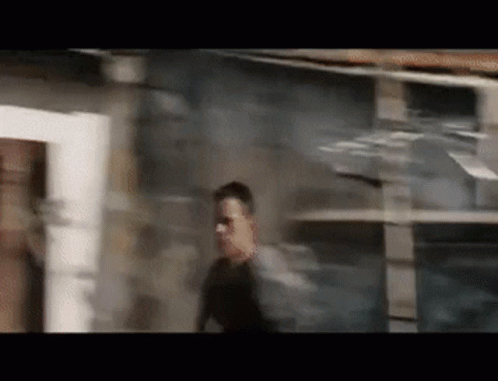 Jason Bourne Running On The Roof GIF