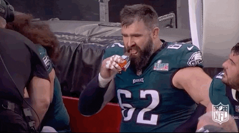 Jason Kelce Eating Energy Bar GIF