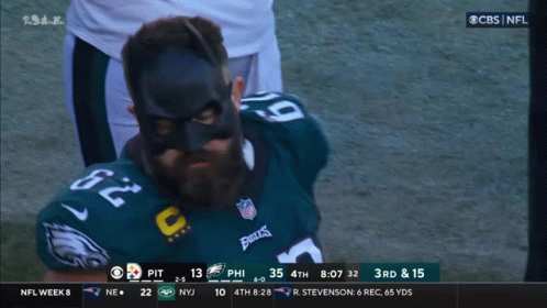 Jason Kelce Talking To Another Guy GIF