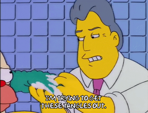 Jay Leno 480 Trying To Get Tangles Out GIF