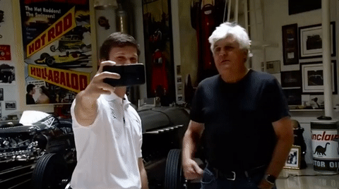 Jay Leno Getting Picture With A Fan GIF