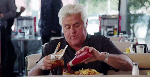 Jay Leno Putting Ketchup On Food GIF