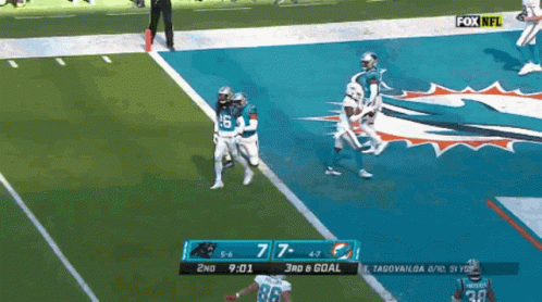 Jaylen Waddle Touchdown Celebration Penguin Dance GIF